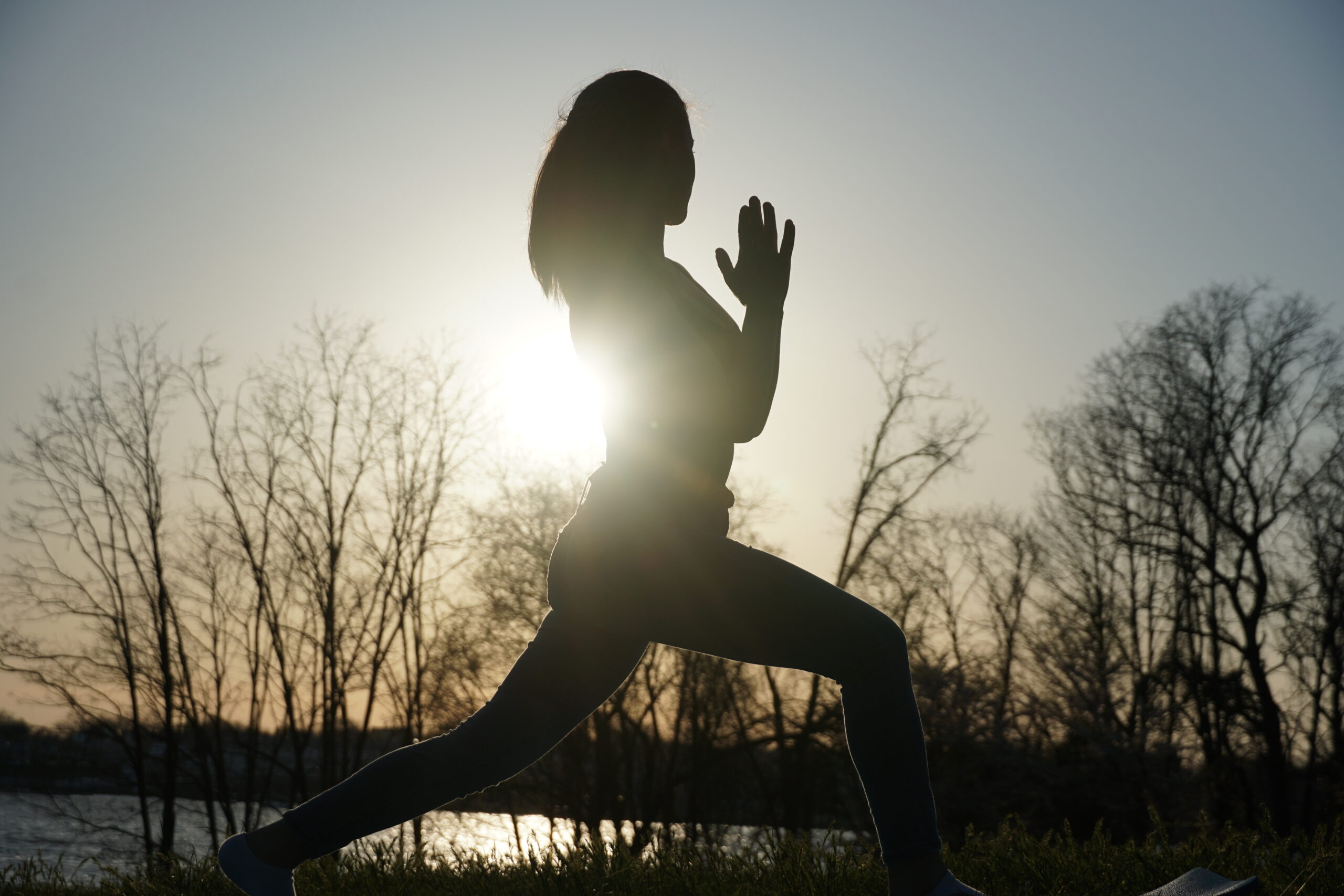 Liz practicing yoga outdoors